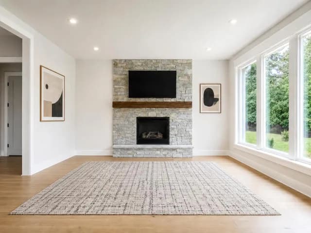 The same room with the existing furniture removed by AI and the room itself left intact